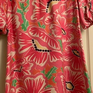 A colourful  and well crafted dress with gorgeous sleeves.